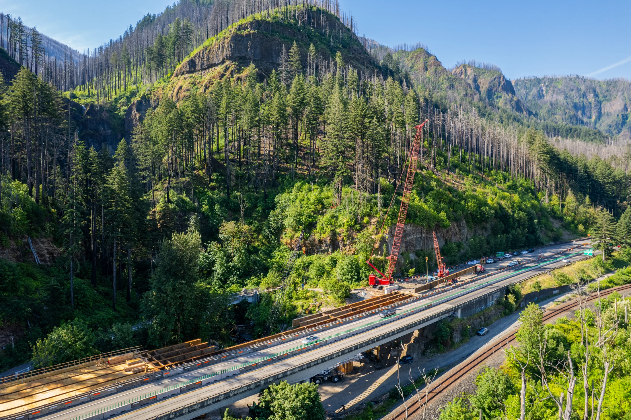 Aerial photograph of the McCord Creek bridge project in the green Gorge
